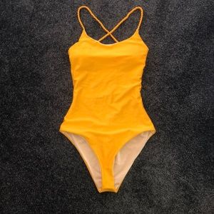 Yellow One piece bathing suit. Never worn